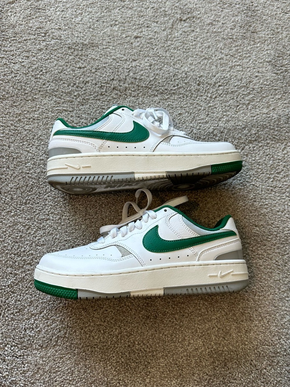 Nike White Sneakers with Green Swoosh and Accents